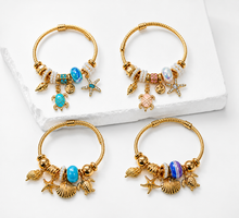 Load image into Gallery viewer, Gold Ocean Charm Bracelet (BR-56)
